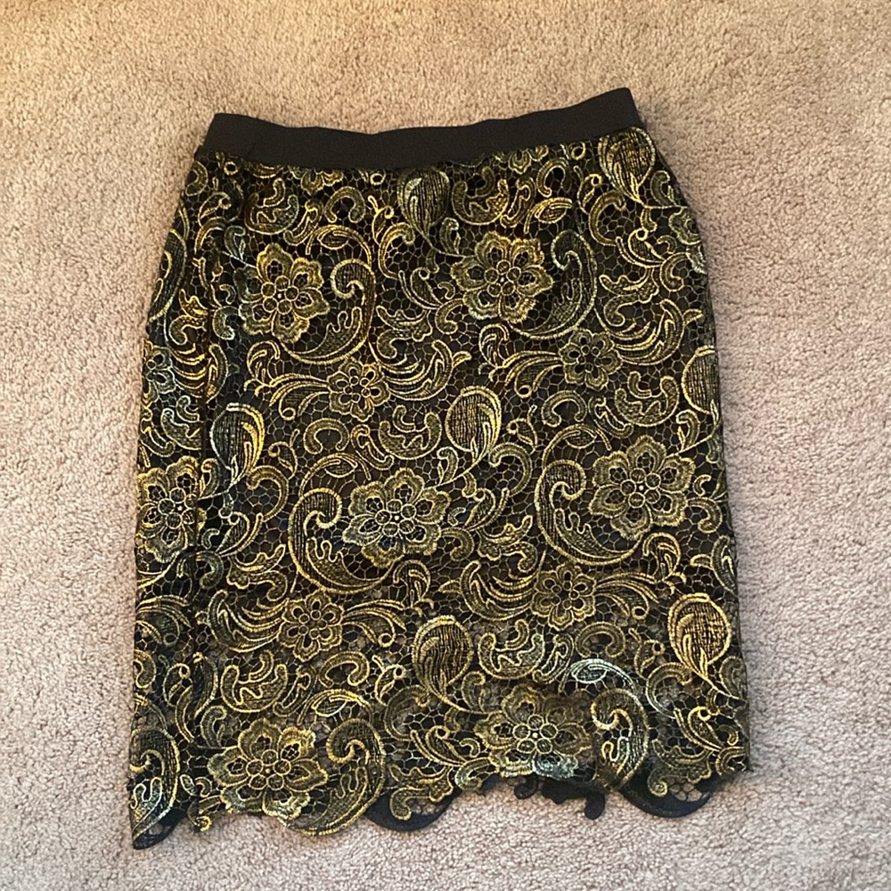 Beautiful gold baroque style skirt with black underlay.